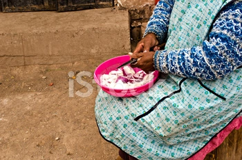 Woman cutting onion