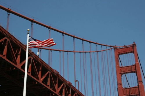 Golden Gate Bridge and American flag