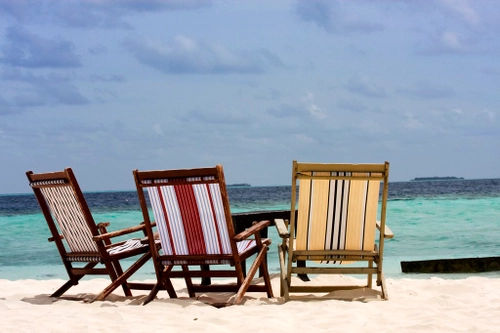 Lounge chairs on the beach 4